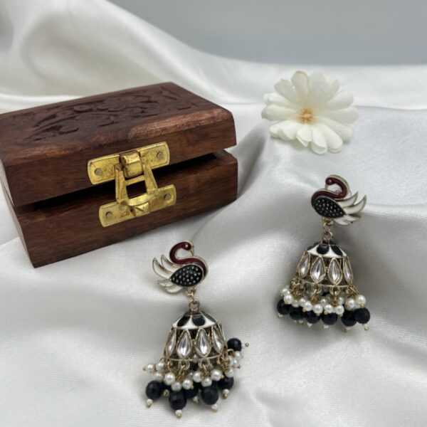 Mayurvaani - Handcrafted with Kohled Pearls