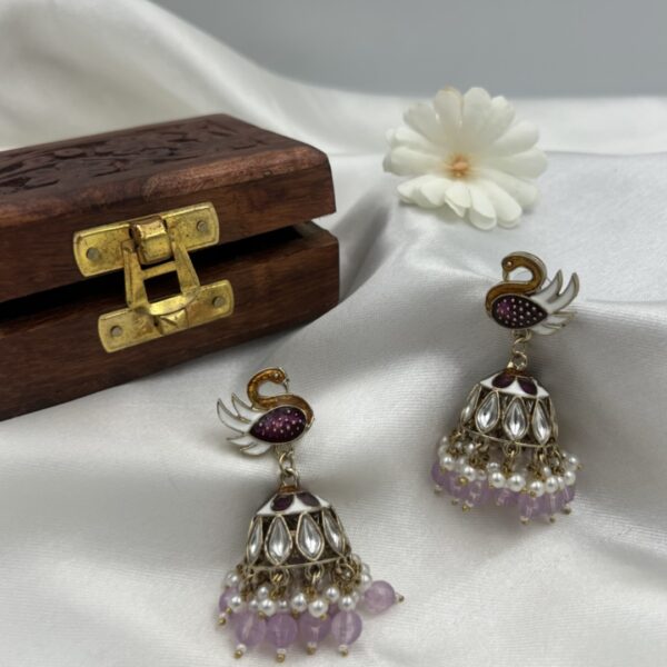 Mayurvaani - Handcrafted with Baingani Pearls