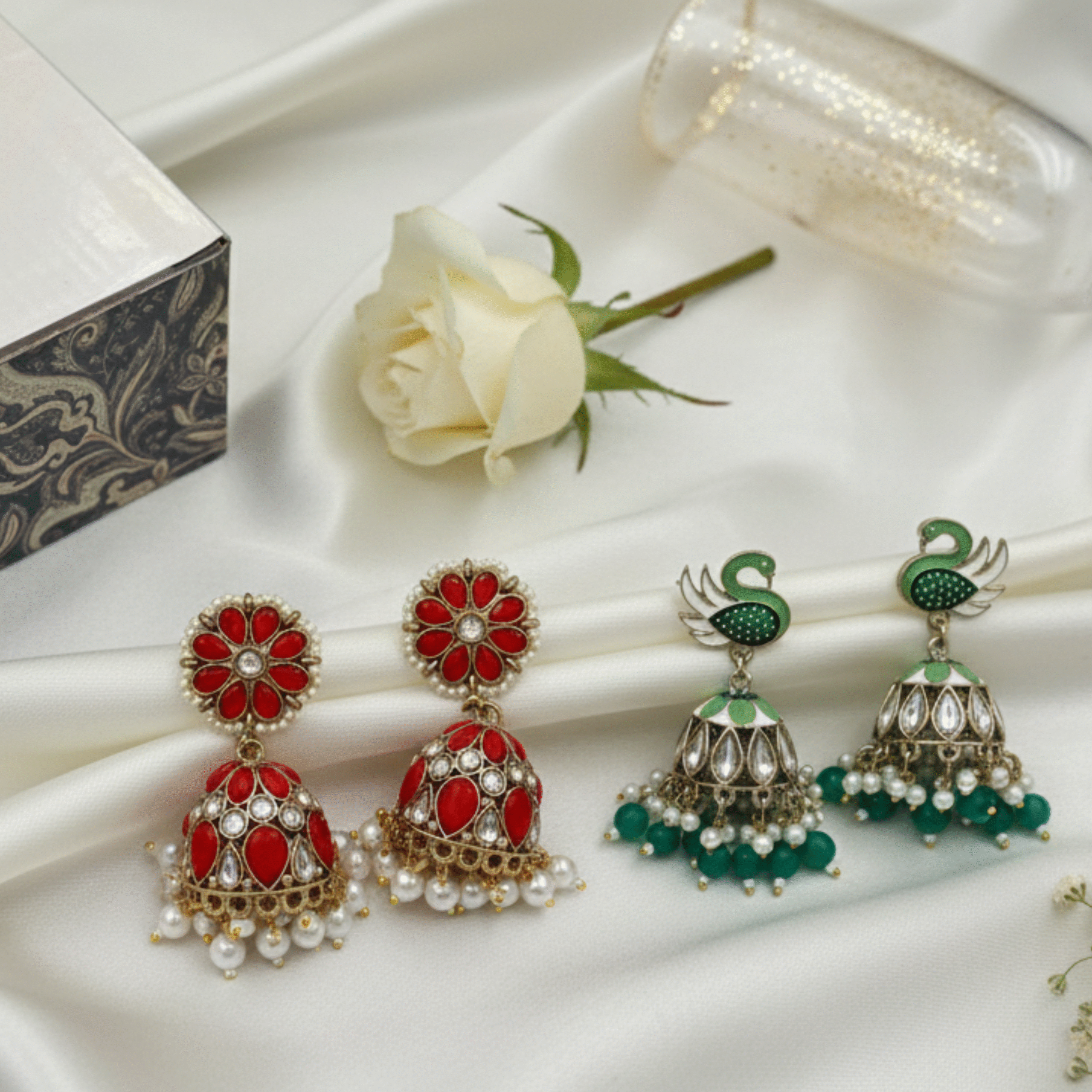 This ensemble is a personal tribute to the radiant spirit of the bridesmaid, a dear one who dances through the celebrations by your side. The Sangeet Serenade is a duo of exquisite Jhumka designed not just to adorn, but to carry the melody of wedding joy. When you wear these, you wear a promise—the rhythm of shared laughter and the timeless grace of everlasting affection.